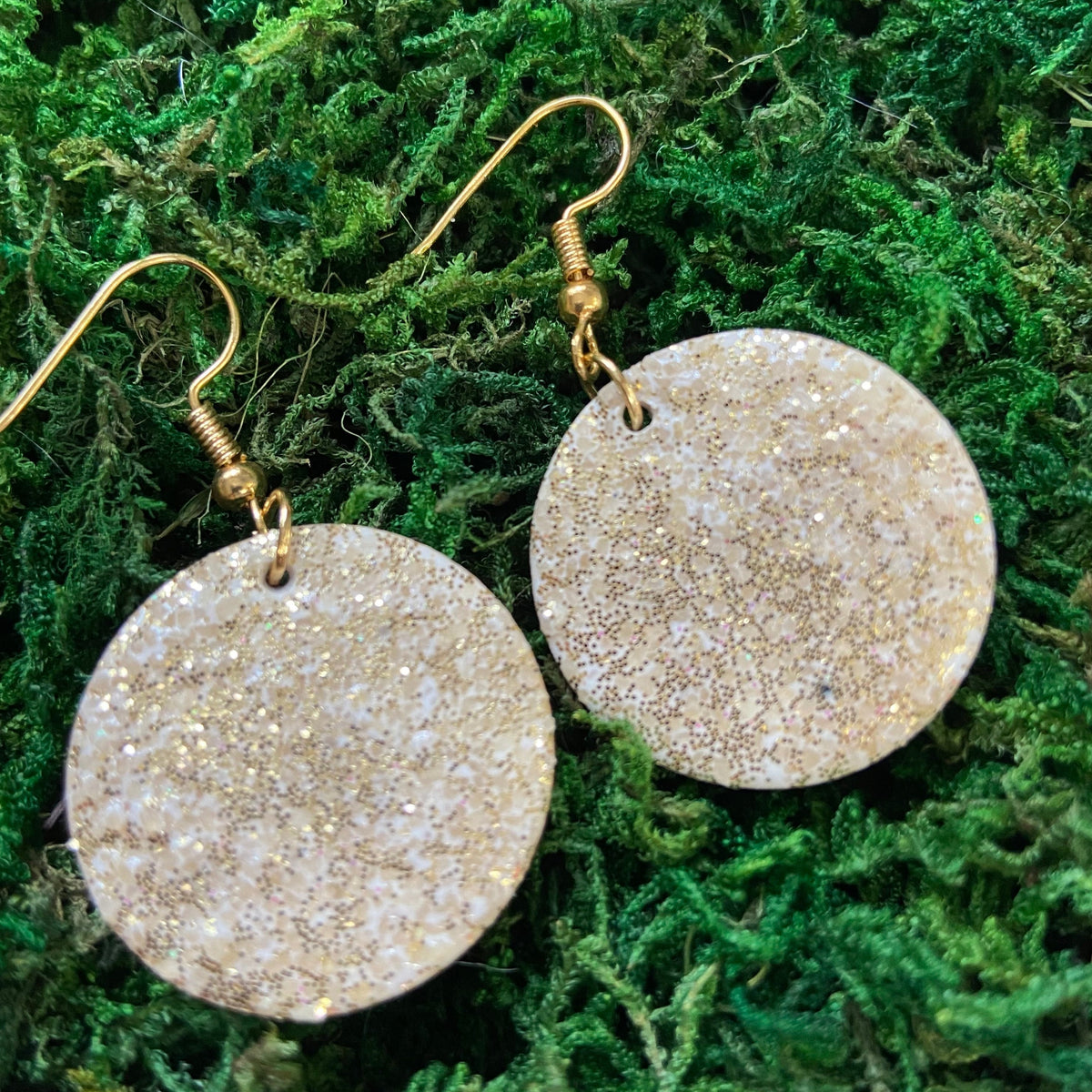 Handcrafted round resin drop earrings with sparkling sand texture