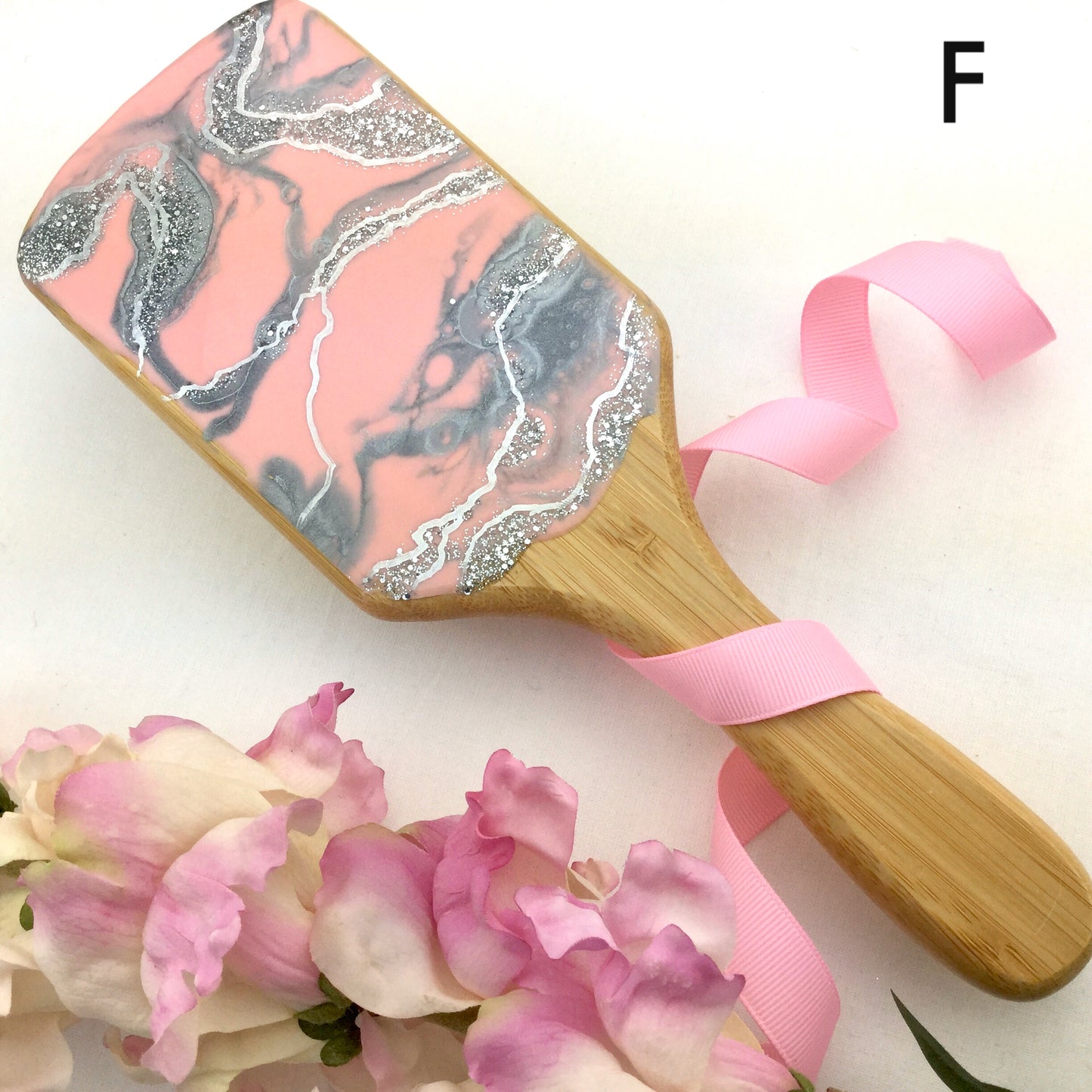 Pink and silver geode resin art on detangling spa hairbrush - Mamota Creative